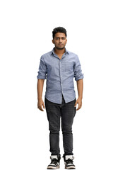 Full length young man in a blue shirt on a white background