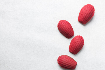 Top view of Red velvet madeleines on a marble tray, red madeleines cake or cookies for valentines