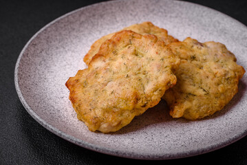 Delicious juicy fried chicken or pork pancakes with salt, spices and herbs