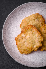Delicious juicy fried chicken or pork pancakes with salt, spices and herbs