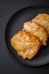 Delicious juicy fried chicken or pork pancakes with salt, spices and herbs