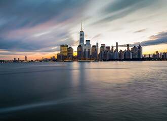 Naklejka premium New York City. Manhattan downtown skyline skyscrapers at sunset.