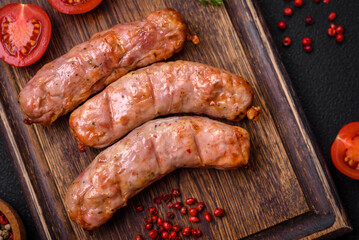 Delicious juicy grilled chicken or pork sausages with salt, spices and herbs