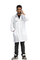 male doctor on a white background. talking on the phone