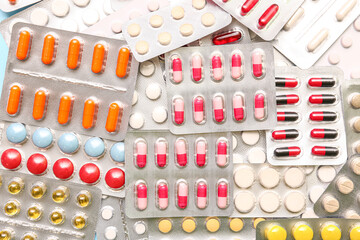 Blister packs with different pills as background