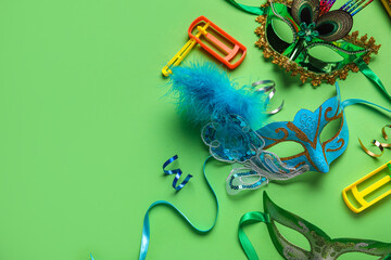 Carnival masks with decor on green background