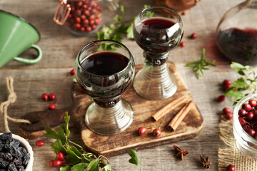 Medicinal wine prepared from hawthorn berries in two glass cups