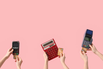 Women with credit cards, payment terminals and calculator on pink background - obrazy, fototapety, plakaty