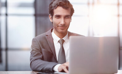 Successful businessman working inside office, man in business suit