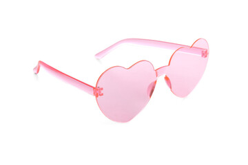 Pink heart shaped sunglasses on white background. Valentine's Day concept