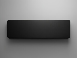 Black Rectangular Object Hanging on Gray Background. Copy space, mock up, banner.
