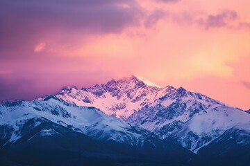Majestic Snow-Capped Mountain Peaks at Sunset