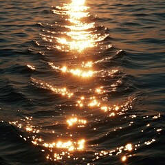 Obraz premium The sun shines out into the water at sunset