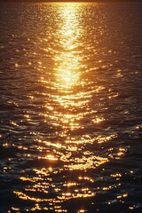 The sun shines out into the water at sunset
