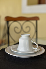cup of coffee, cup of coffee on a table, close up of china set, china set, white porcelain plates and cups, glass plates and cups, plates and cups, table set, white dinnerware, porcelain dinnerware