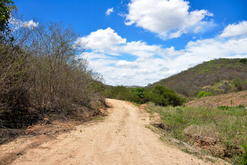 road in the forest, road in the mountains, park with mountain, old stone bridge, tourism in brazil, desert road, sand road, clay road, mountain background, backcountry