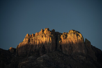 Sunlight Fades Down the Edge of Crown Peak in Big Bend