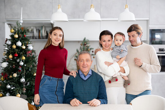 Family members posing for photos on Christmas holidays