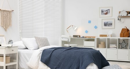 Bedroom interior with comfortable furniture, big window and white blinds