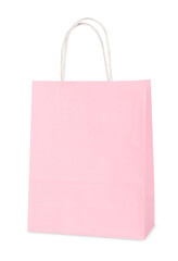 One light pink paper shopping bag isolated on white