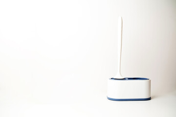 Toilet brush on a white background with space for text. Cleaning concept