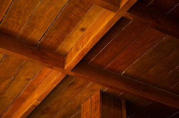 Wooden ceiling in a country house, closeup of photo.