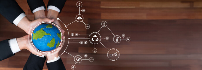Business partnership holding Earth globe together with eco design icon symbolize ESG sustainable...