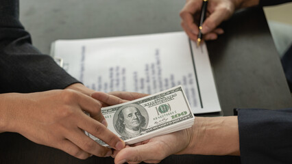 Government officials receive bribes from businessmen who have ideas about corruption and...