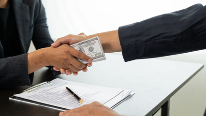 Government officials receive bribes from businessmen who have ideas about corruption and...