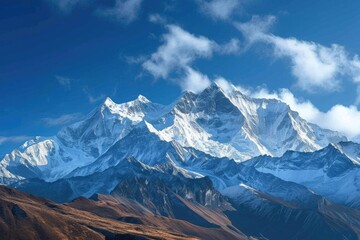 Fototapeta premium A majestic mountain range with snow-capped peaks and a clear blue sky Capturing the awe-inspiring beauty of nature