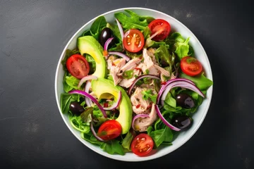Fotobehang Healthy tuna salad with lettuce tomatoes avocado and onions French cuisine style top view flat lay © The Big L