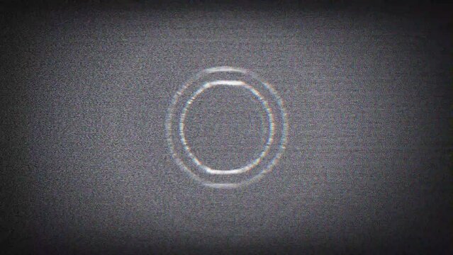 Distorted circles in motion with static television and gray colors