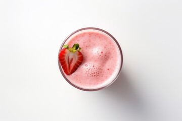 Top view of a glass containing a refreshing strawberry milkshake or smoothie, standing alone against a white background.