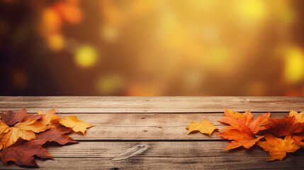 Naklejka na ściany i meble beautiful wooden table with orange autumn leaves background