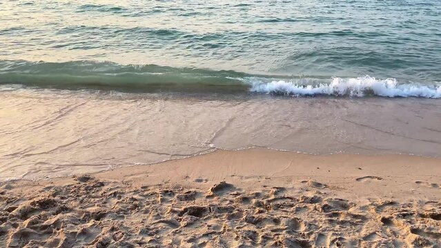 Tropical sea beach with beautiful sand and waves in summer