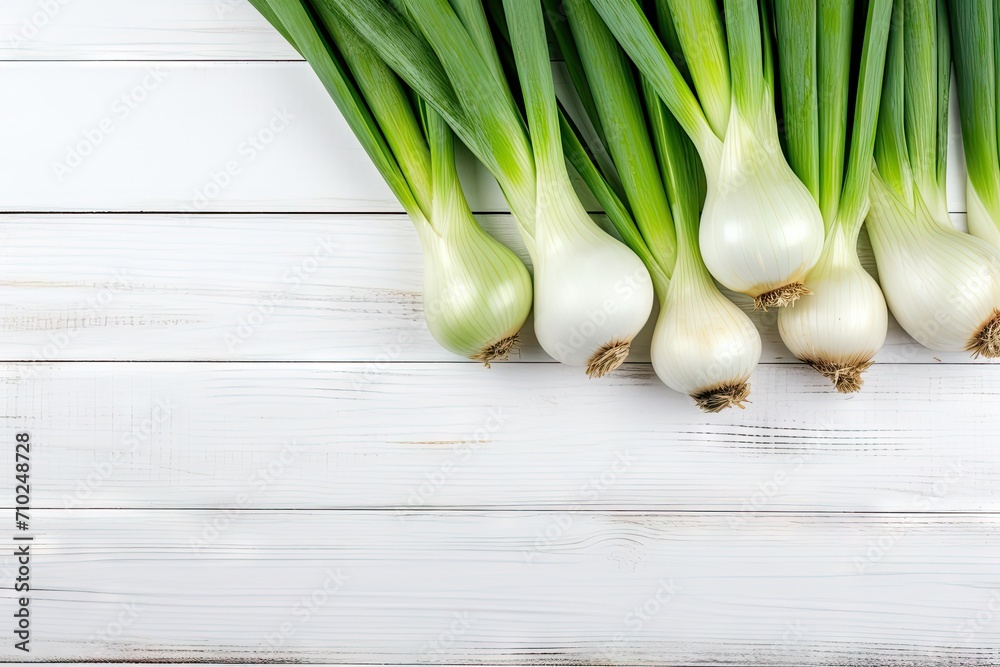 Sticker White wooden background with leek and vegetables top view free space