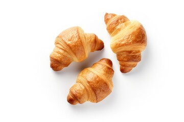 French breakfast with fresh croissants presented creatively on a white background representing healthy and delicious food From a top view perspective it serves - obrazy, fototapety, plakaty