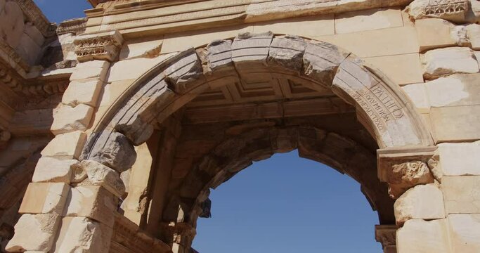 Looking up at stone archway in Ephesus