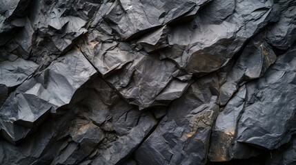 Rock texture background. dark black rough mountain surface. textured stone background with space for design

