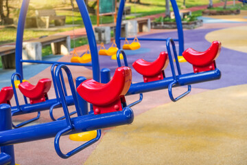 Seesaw blue red toy for children in the park