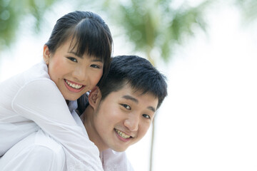 Happy Asian couple.