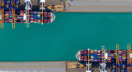 Global transportation and logistic business. Aerial top view over international containers cargo ship at industrial import-export port prepare to load containers with big container loader ship vessel. - obrazy, fototapety, plakaty