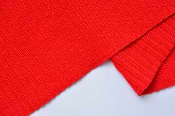 overlap of red wool knitted yarn texture, woolen fabric background