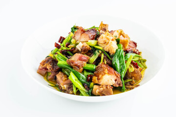 A plate of stir-fried bacon chicken