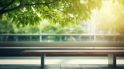 Photo sur Aluminium Couleur pistache blurred abstract background of bench under tree in green at modern eco office building in sunny day