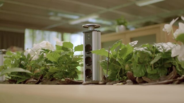 Renewable energy power socket on the table, today's modern technology