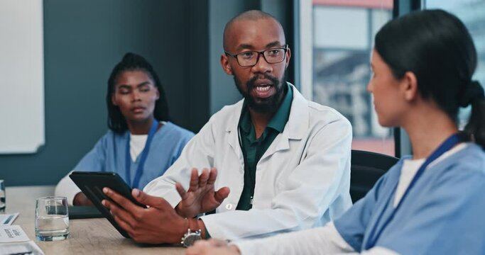 Leadership, tablet or doctors in meeting for planning strategy or research in collaboration in hospital. Discussion, healthcare or group of nurses speaking of online news report, feedback or schedule