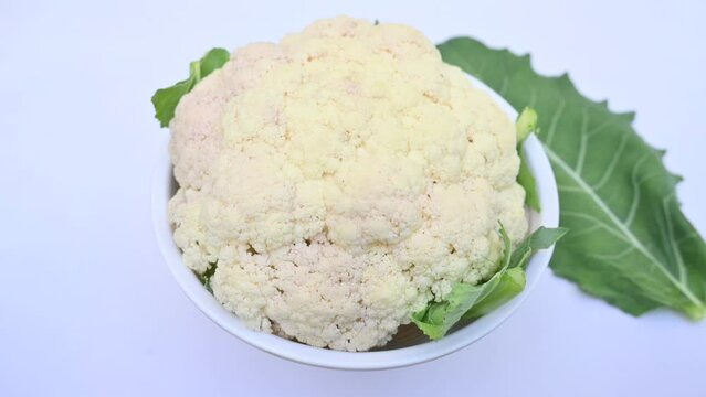 Cauliflower on white background. It is one of several vegetables in the species in the genus Brassica, which is in the Brassicaceae family. Its other names Brassica oleracea, Brussels sprouts and cole