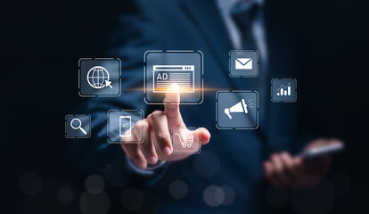 Businessman touching virtual advertisement icon for ad on website or social media, online ads and digital marketing. Online advertisement concept.