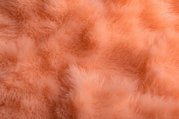 An abstract background of fluffy peach fuzz with a delicate and dreamy texture.